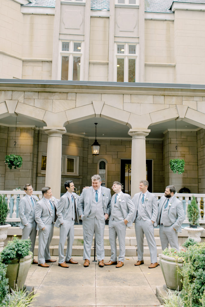 groom and groomsmen in grey
