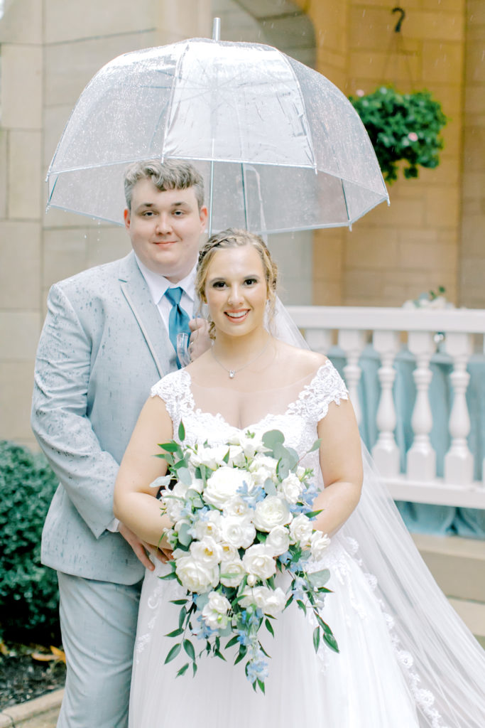 rainy bride and groom portrait in front of the wimbish house in atlanta georgia