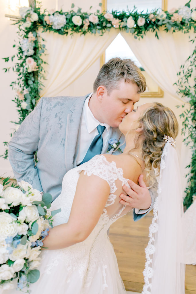 bride and groom dip kiss