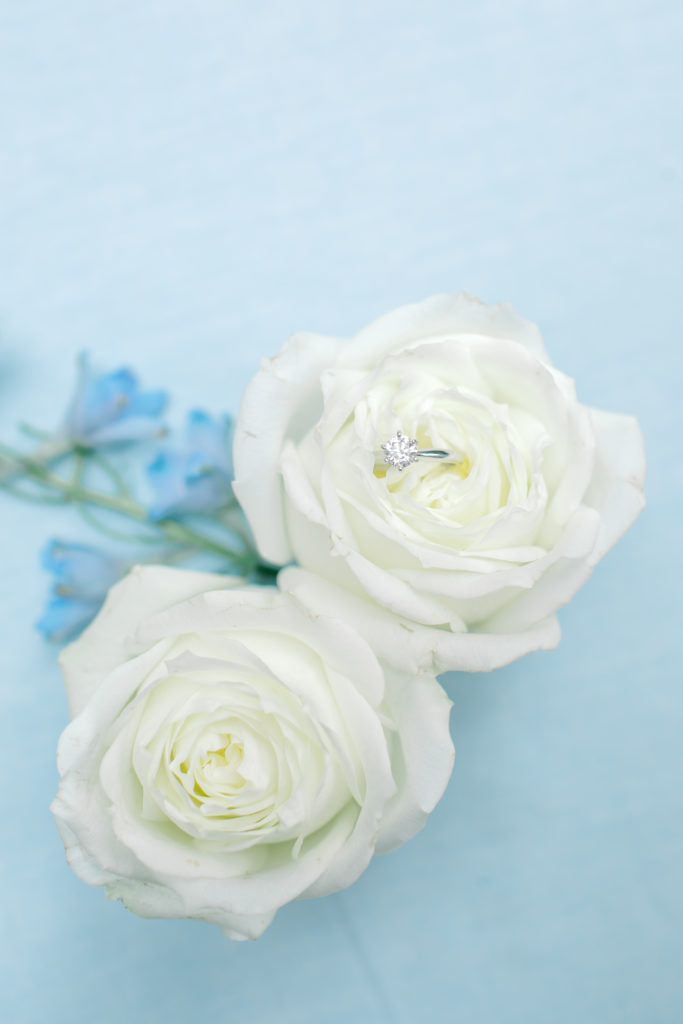 wedding ring inside of flower