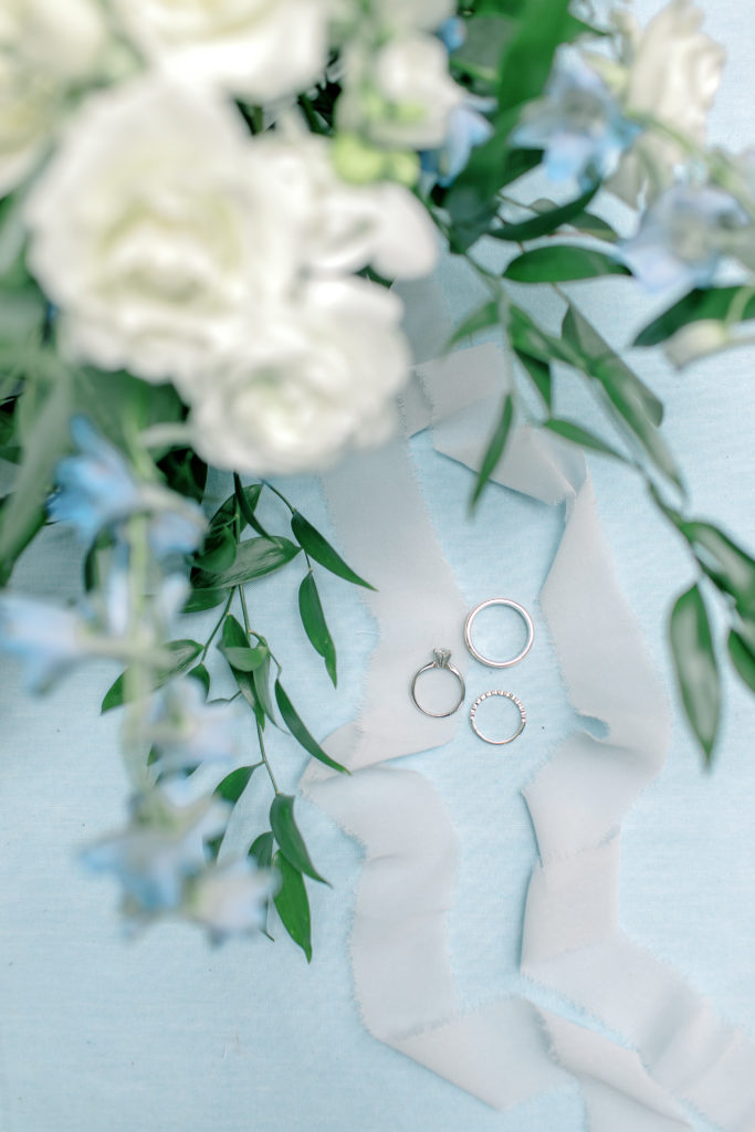 weddign rings with wedding flowers