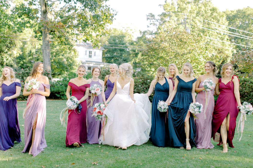 bridesmaids in shades of purple and blues
