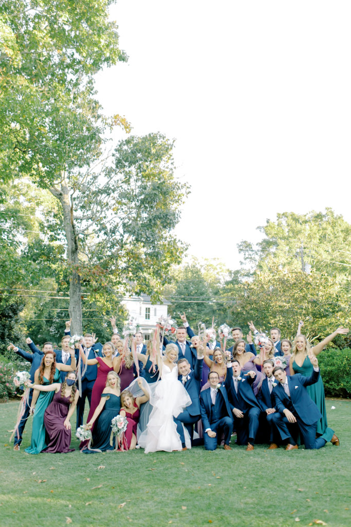 group photo with bride and groom and bridal party