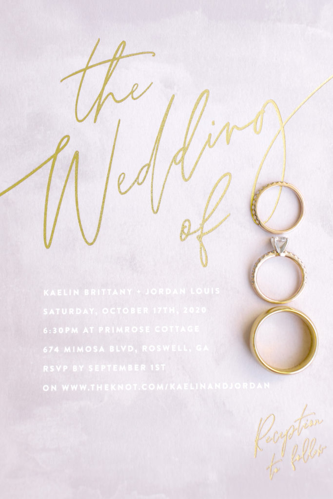 wedding ring styled on an invitation for a wedding in atlanta