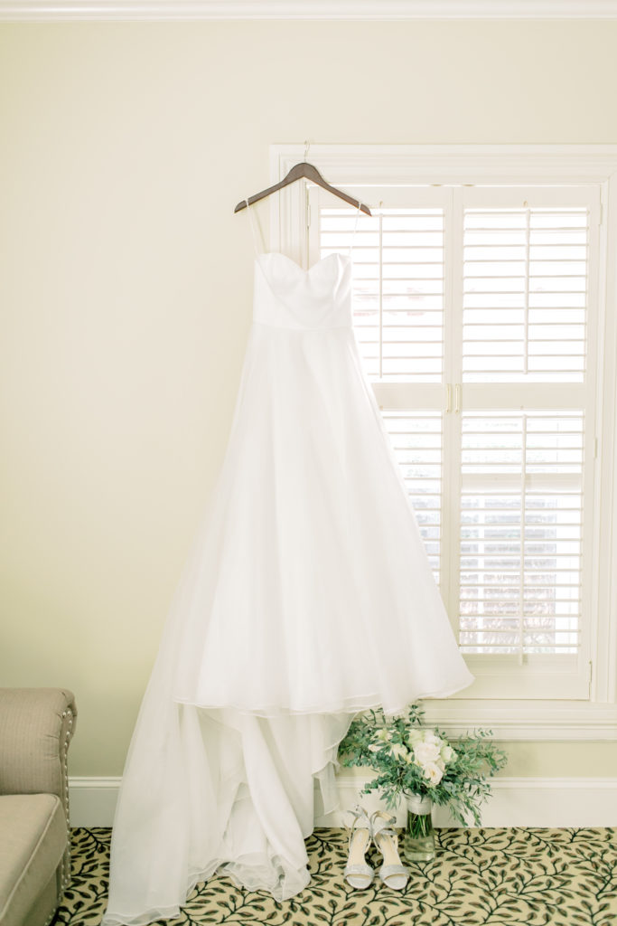 bridal gown hanging up at the green valley vountry club in greenville south carolina