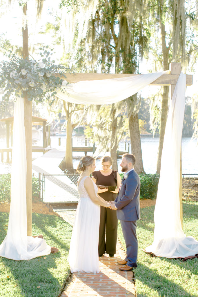 Bride and Groom saying their vows at the altar | Jacksonville, Wedding Photographer | Photo by Mary Catherine Echols
