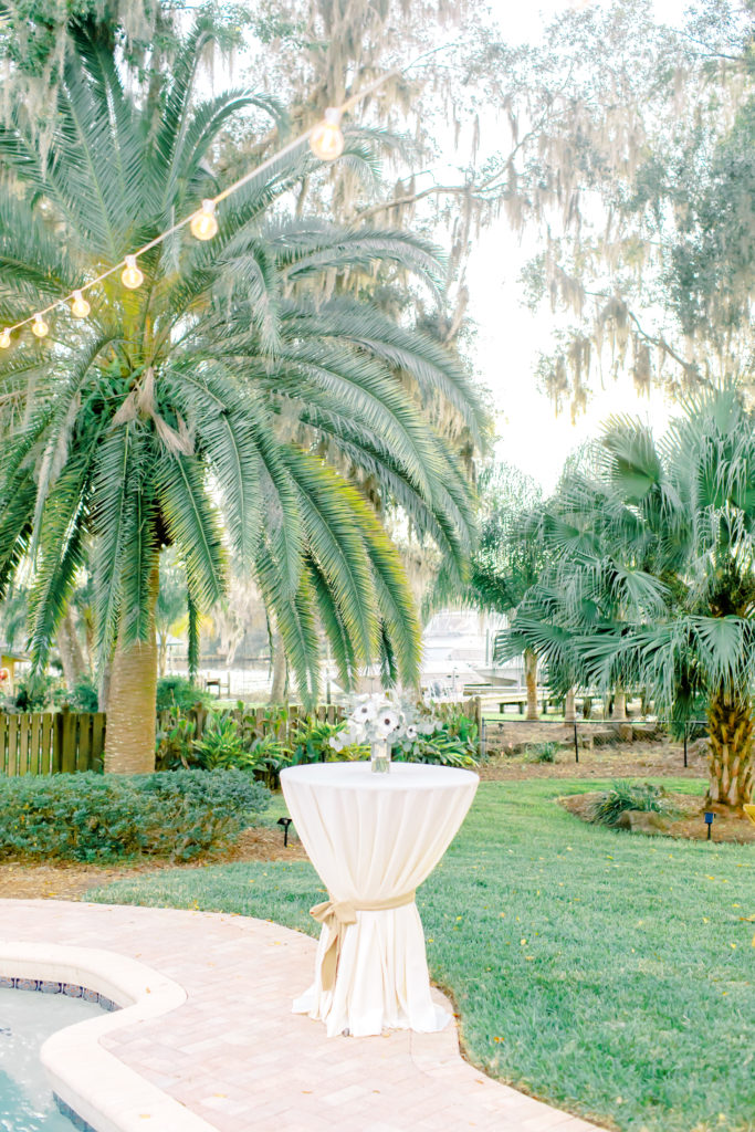 Wedding Reception high top table by the pool | Jacksonville Wedding Photographer | Photo by Mary Catherine Echols