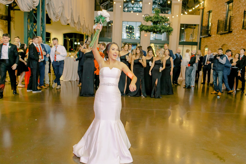 bouquet toss at reception  | photo by mary catherine echols, a jacksonville florida based photographer