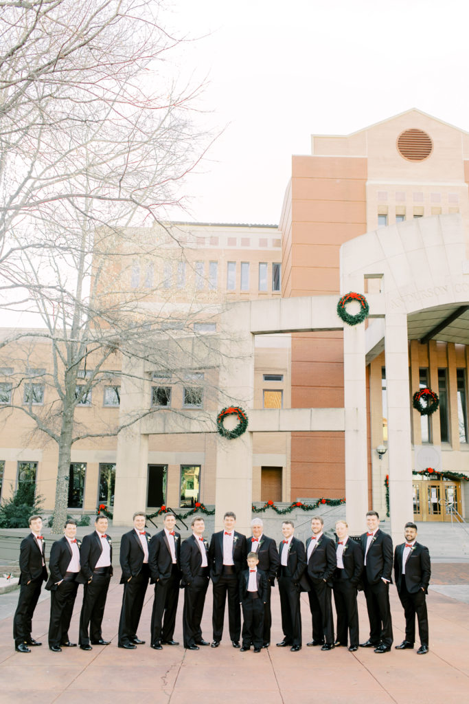 groom and groomsmen in downtown anderson at christmas time | Photo by Mary Catherine Echols