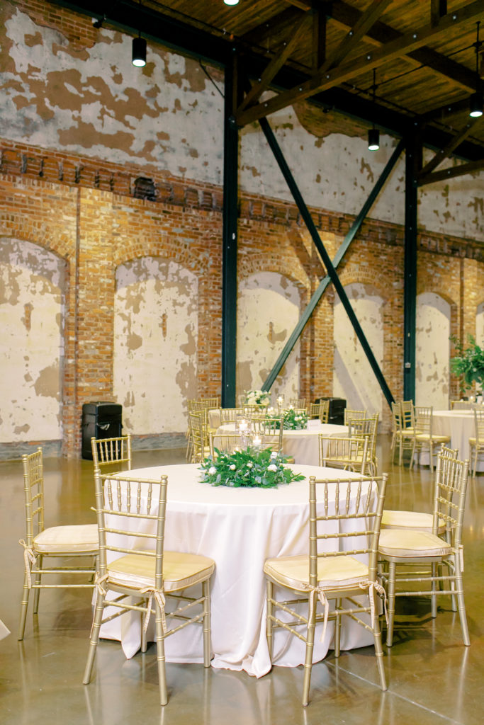 white reception tables with greenery centerpiece at the bleckley station in anderson sc  | photo by mary catherine echols, a jacksonville florida based photographer