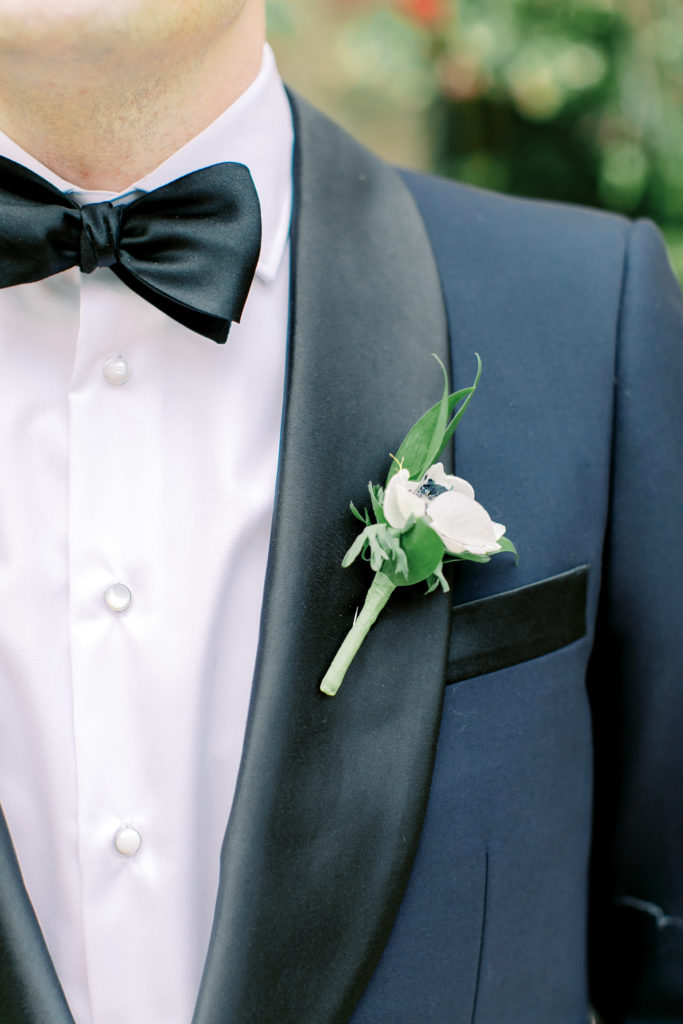 close up shot of the boutonniere | Photo by Mary Catherine Echols, a photographer based out of Jacksonville, Florida