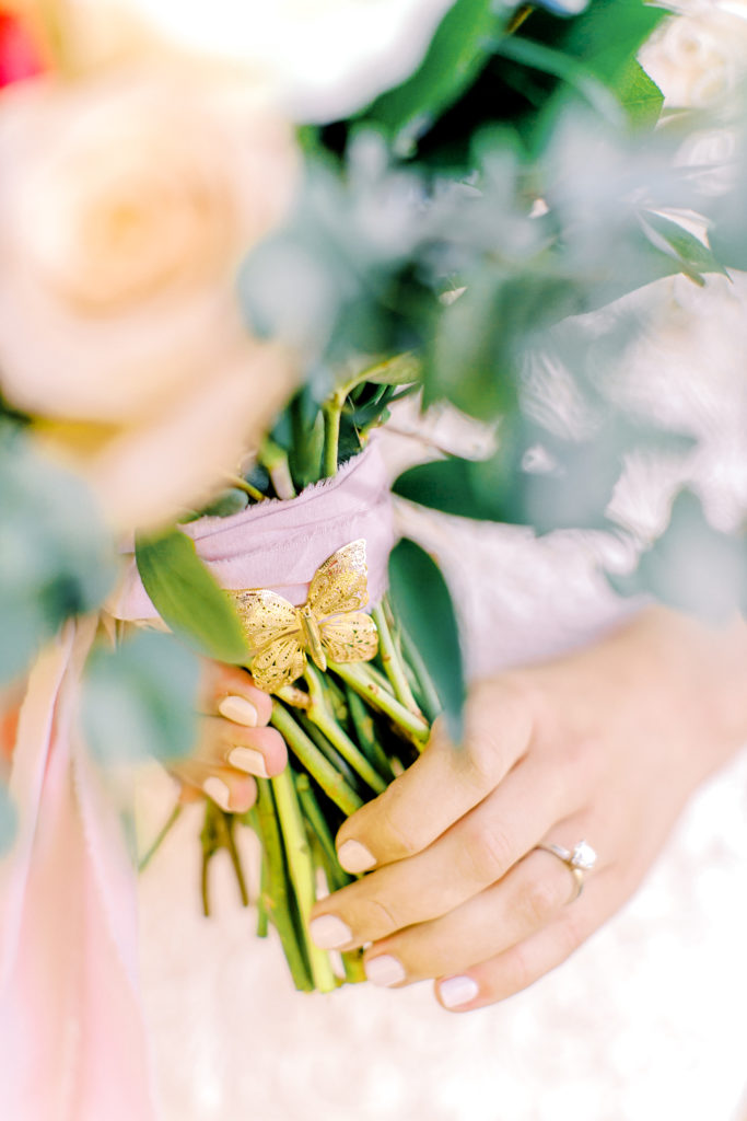 locket on bride's bouquet | photo by mary catherine echols