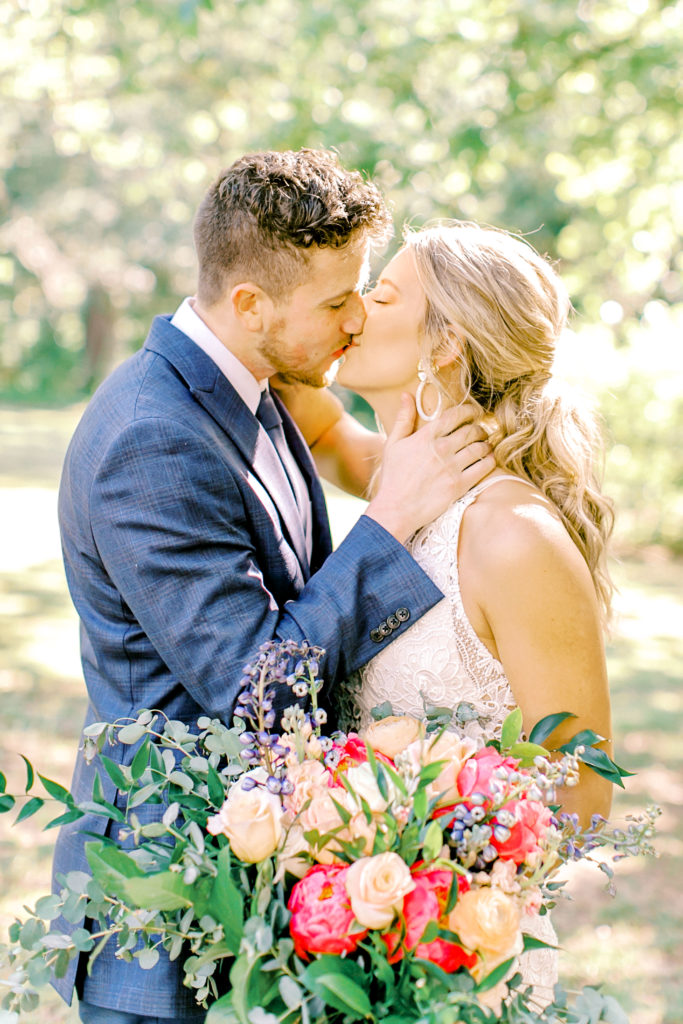bride and groom kiss, southern elopement | photo by mary catherine echols
