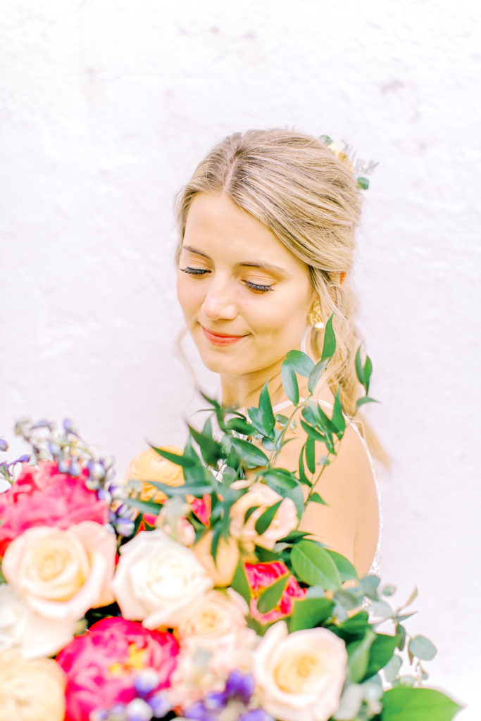 close up shot of bride with her bouquet | photo by mary catherine echols