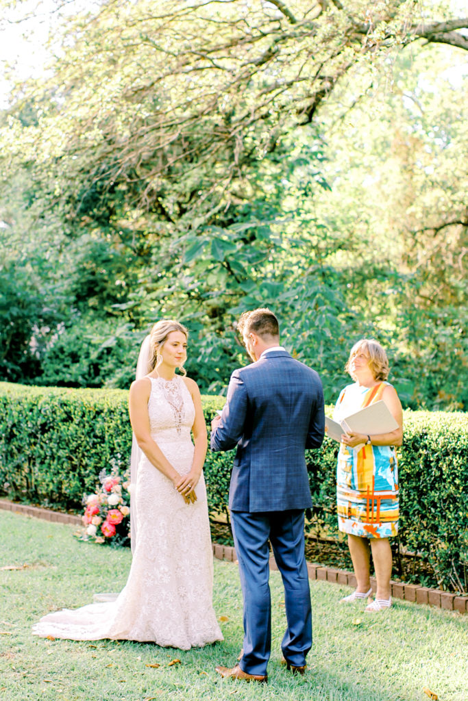 bride listens to groom saying his vows | photo by mary catherine echols