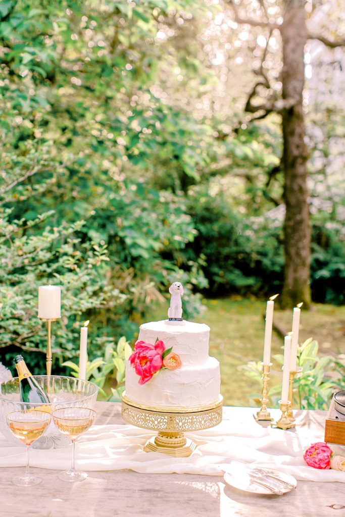 cake table with candles and bright flowers | photo by mary catherine echols