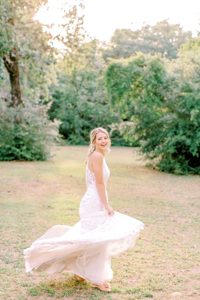 bride twirls her dress | photo by mary catherine echols