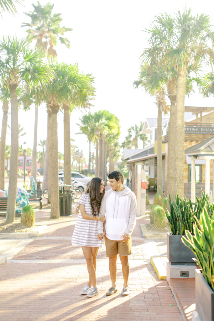 couple looking at each other in atlantic beach town square
