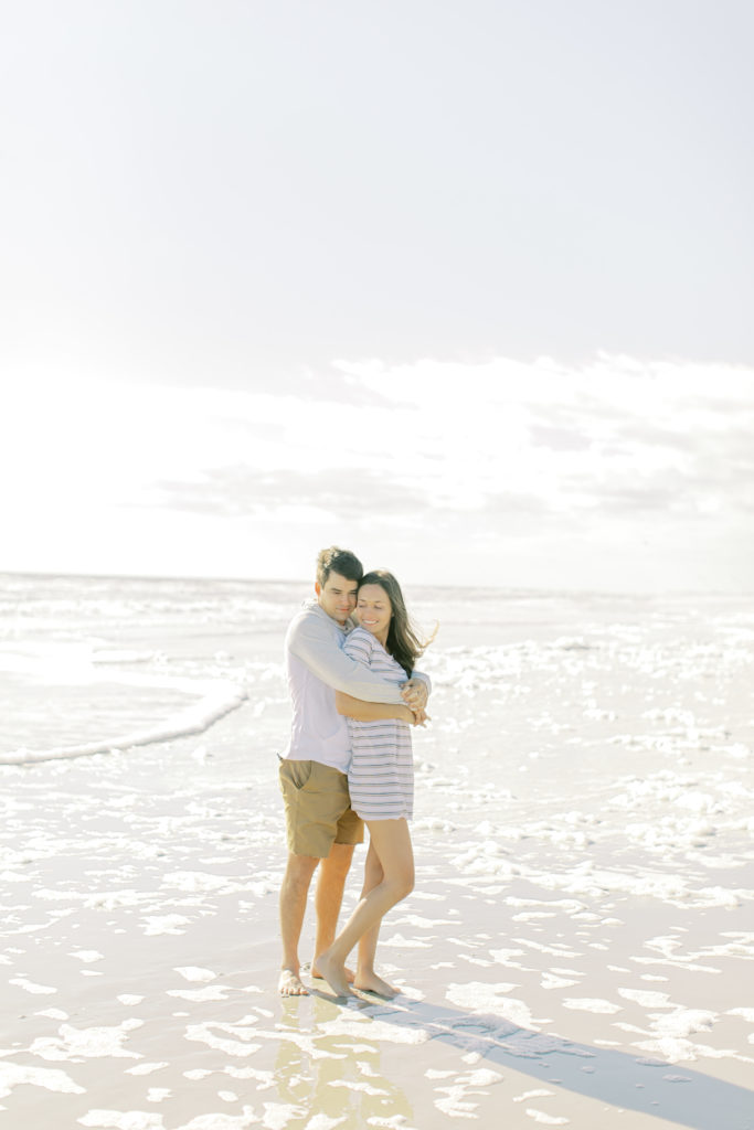 couple hugs on jax beach
