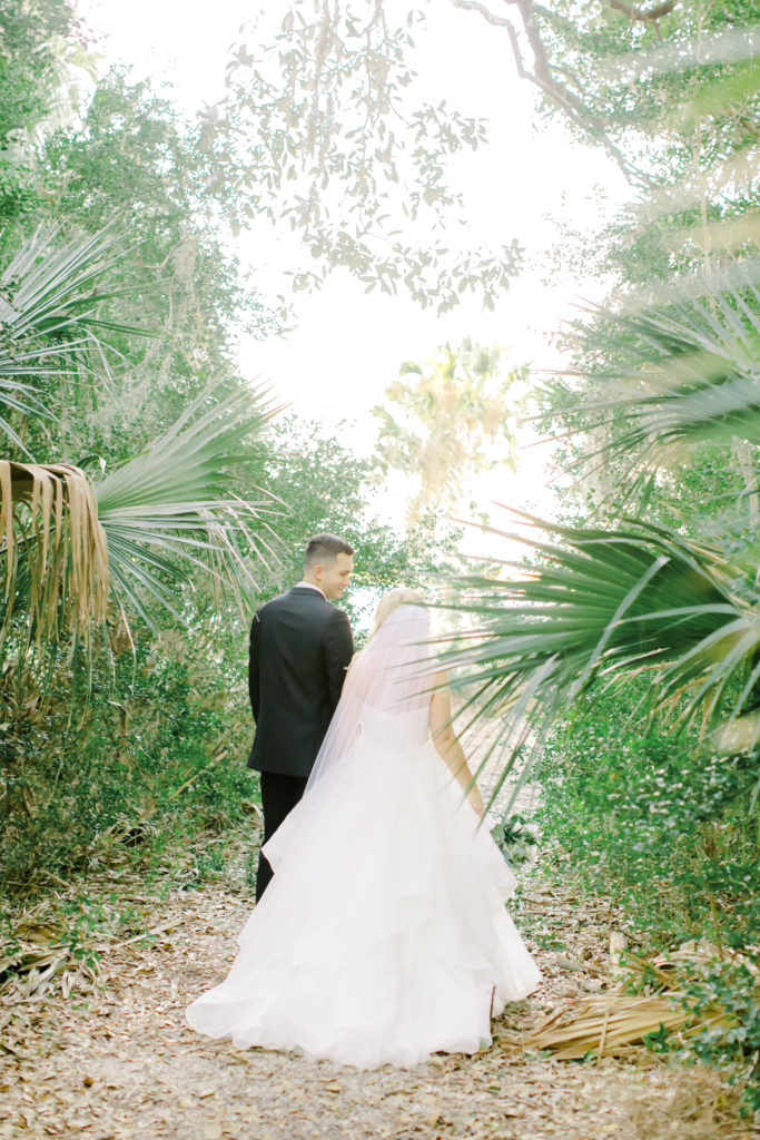 bride and groom walking away | photo by Mary Catherine Echols, a Jacksonville based wedding photographer