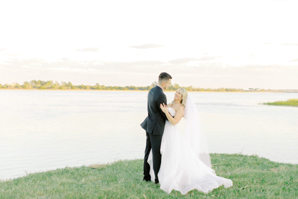 bride and groom portraits by the water at the ribault club | photo by Mary Catherine Echols, a Jacksonville based wedding photographer