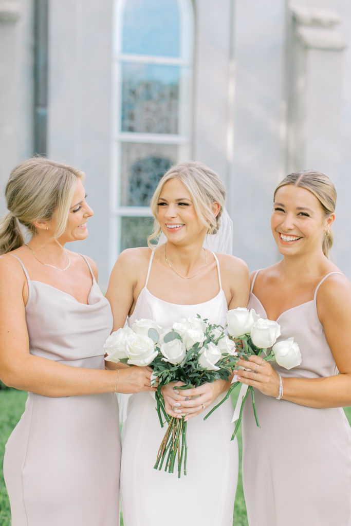 bridesmaids laughing with each other