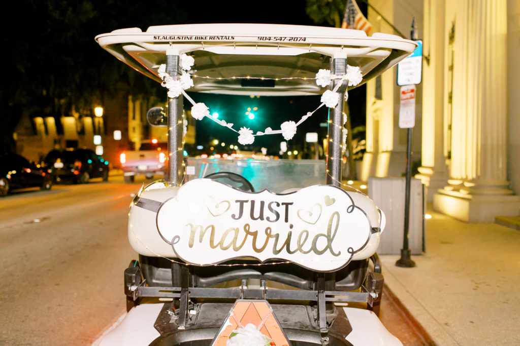 golf cart that says just married on the back
