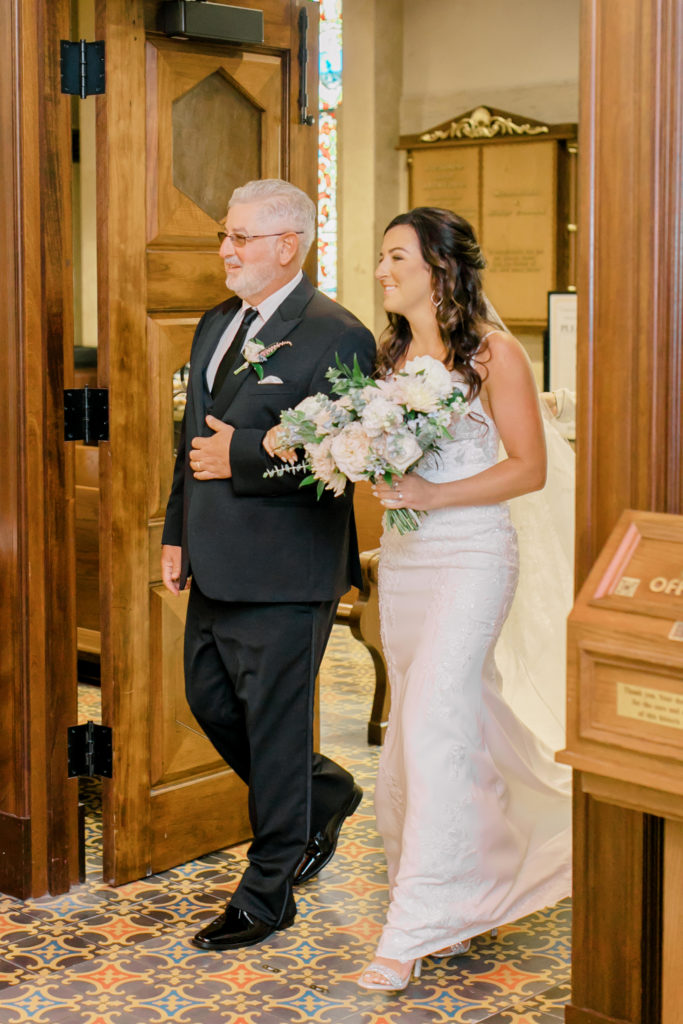 dad walking in ceremony with bride