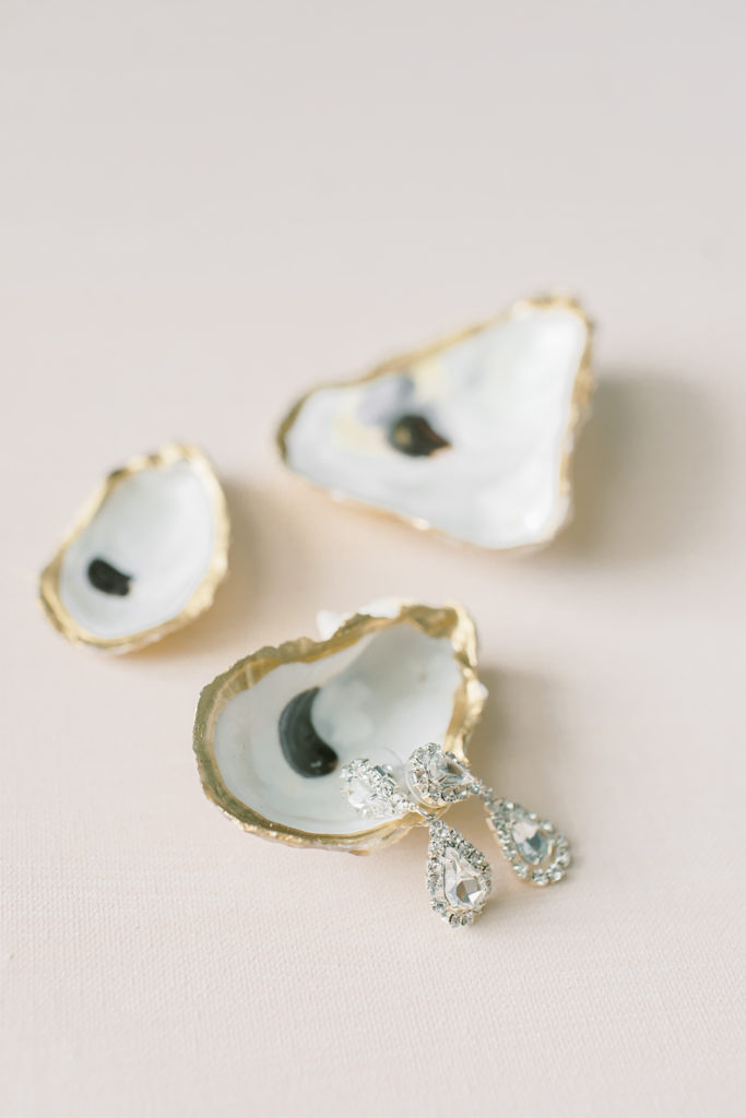 earrings in oyster shells