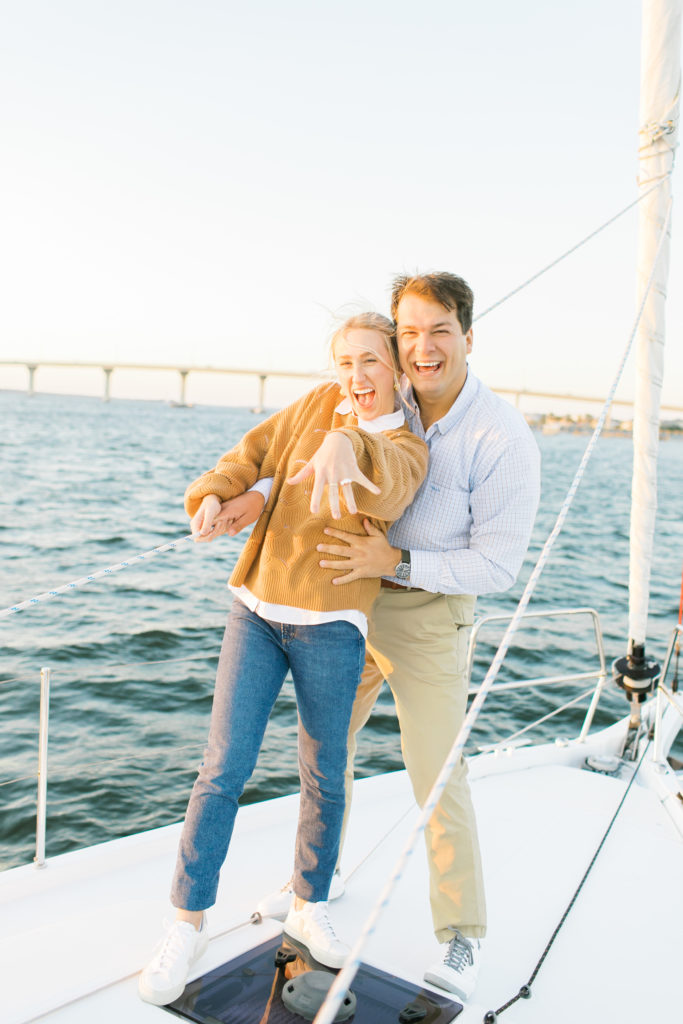 couple engaged on a sailboat in st Augustine Florida