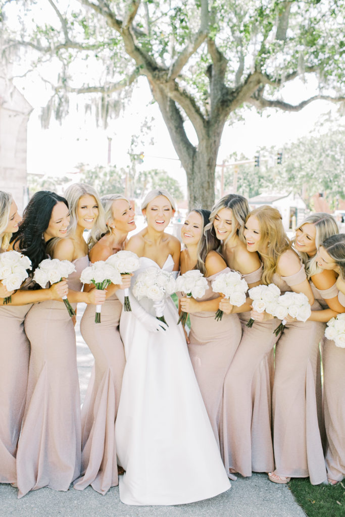 bride and bridesmaids in st Augustine Florida at the treasury wedding venue